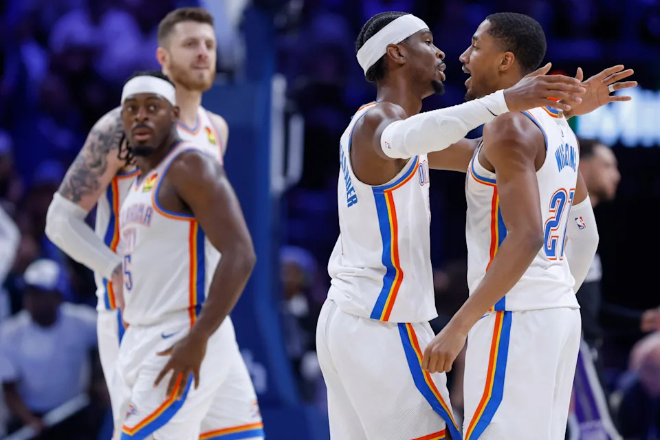 Oklahoma City Thunder guard Shai Gilgeous-Alexander (2) celebrates with guard Aaron Wiggins (21) during an NBA game between the Oklahoma City Thunder and the Sacramento Kings at Paycom Center in Oklahoma City, Tuesday, Oct. 28, 2025. The Thunder win 107-101.