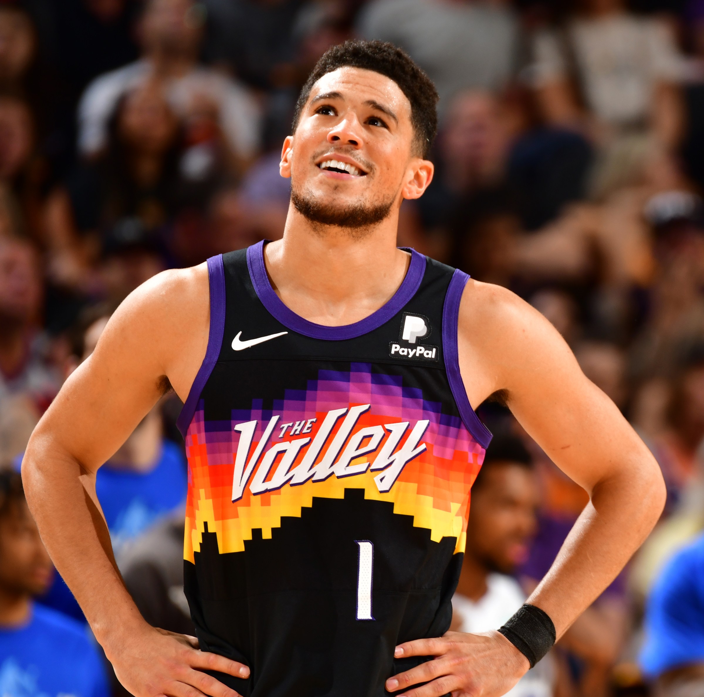PHOENIX, AZ - MAY 10: Devin Booker #1 of the Phoenix Suns looks on during Game 5 of the 2022 NBA Playoffs Western Conference Semifinals on May 10, 2022 at Footprint Center in Phoenix, Arizona. NOTE TO USER: User expressly acknowledges and agrees that, by downloading and or using this photograph, user is consenting to the terms and conditions of the Getty Images License Agreement. Mandatory Copyright Notice: Copyright 2022 NBAE (Photo by Barry Gossage/NBAE via Getty Images)