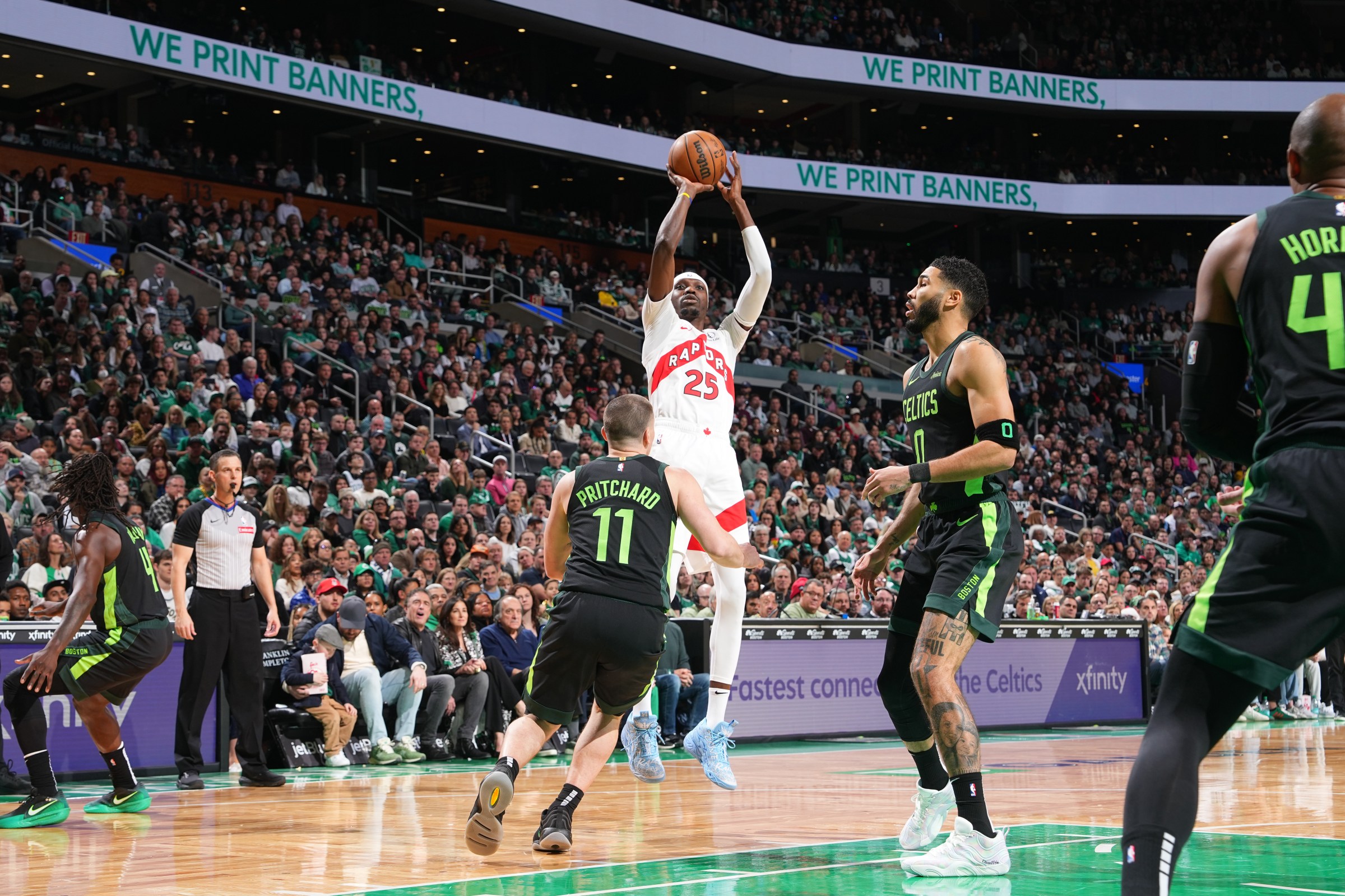 BOSTON, MA - DECEMBER 31: Chris Boucher #25 of the Toronto Raptors shoots a three point basket during the game against the Boston Celtics on December 31, 2024 at TD Garden in Boston, Massachusetts. NOTE TO USER: User expressly acknowledges and agrees that, by downloading and/or using this Photograph, user is consenting to the terms and conditions of the Getty Images License Agreement. Mandatory Copyright Notice: Copyright 2024 NBAE (Photo by Jesse D. Garrabrant/NBAE via Getty Images)
