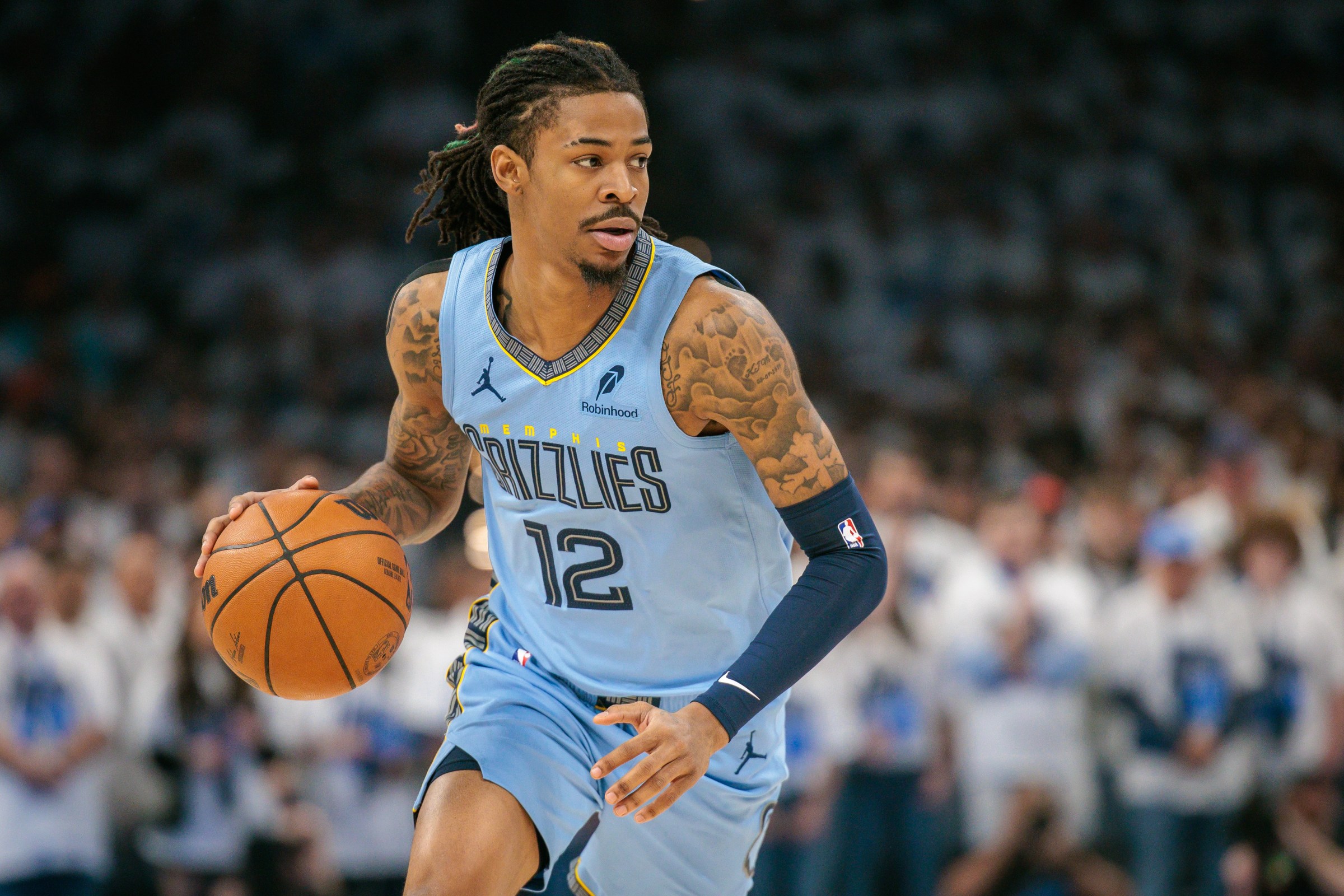OKLAHOMA CITY, OKLAHOMA - APRIL 20: Ja Morant #12 of the Memphis Grizzlies brings the ball up court in the first quarter against the Oklahoma City Thunder during Game One of the Western Conference First Round NBA Playoffs at Paycom Center on April 20, 2025 in Oklahoma City, Oklahoma. NOTE TO USER: User expressly acknowledges and agrees that, by downloading and or using this photograph, User is consenting to the terms and conditions of the Getty Images License Agreement. (Photo by William Purnell/Getty Images)
