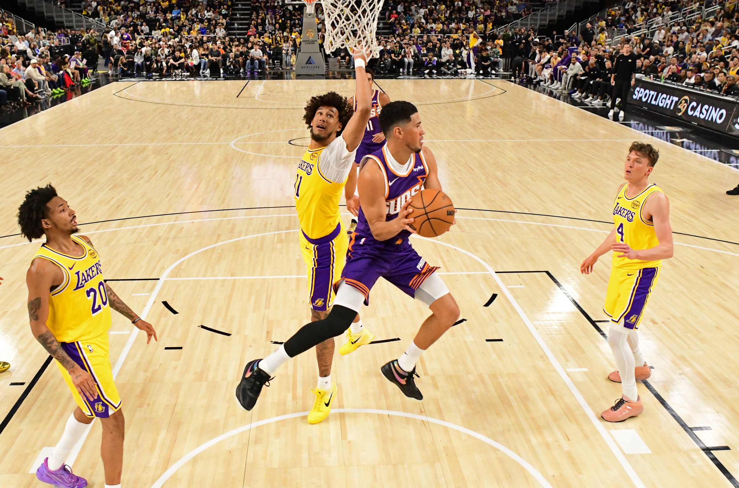 PALM SPRINGS, CA - OCTOBER 3: Devin Booker #1 of the Phoenix Suns looks to pass the ball during the game against the Los Angeles Lakers during Preseason on October 3, 2025 at Acrisure Arena in Palm Springs, California. NOTE TO USER: User expressly acknowledges and agrees that, by downloading and/or using this Photograph, user is consenting to the terms and conditions of the Getty Images License Agreement. Mandatory Copyright Notice: Copyright 2025 NBAE (Photo by Adam Pantozzi/NBAE via Getty Images)