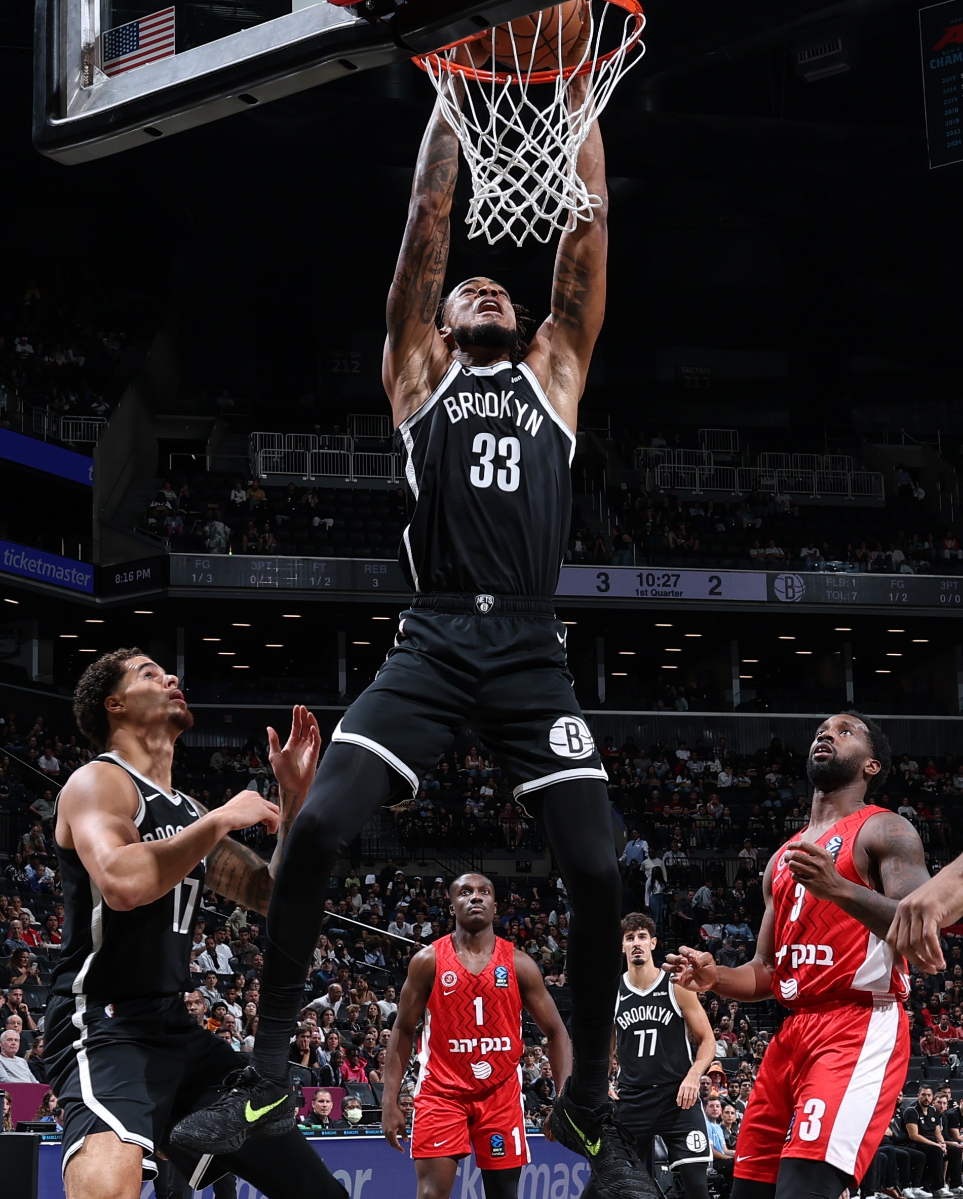 BROOKLYN, NY - OCTOBER 4: Nicolas Claxton #33 of the Brooklyn Nets dunks the ball during the game against Hapoel Jerusalem B.C during Preseason on October 4, 2025 at Barclays Center in Brooklyn, New York. NOTE TO USER: User expressly acknowledges and agrees that, by downloading and or using this photograph, User is consenting to the terms and conditions of the Getty Images License Agreement. Mandatory Copyright Notice: Copyright 2025 NBAE (Photo by David L. Nemec/NBAE via Getty Images)