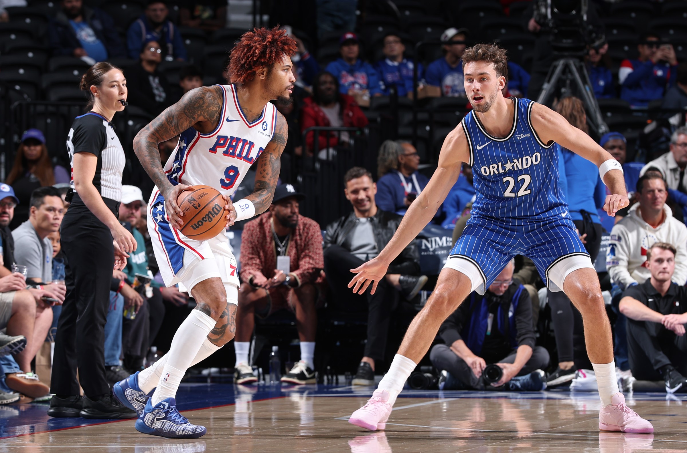 PHILADELPHIA, PA - OCTOBER 10: Franz Wagner #22 of the Orlando Magic plays defense on Kelly Oubre Jr. #9 of the Philadelphia 76ers during the game on October 10, 2025 at the Wells Fargo Center in Philadelphia, Pennsylvania NOTE TO USER: User expressly acknowledges and agrees that, by downloading and/or using this Photograph, user is consenting to the terms and conditions of the Getty Images License Agreement. Mandatory Copyright Notice: Copyright 2025 NBAE (Photo by David L. Nemec/NBAE via Getty Images)