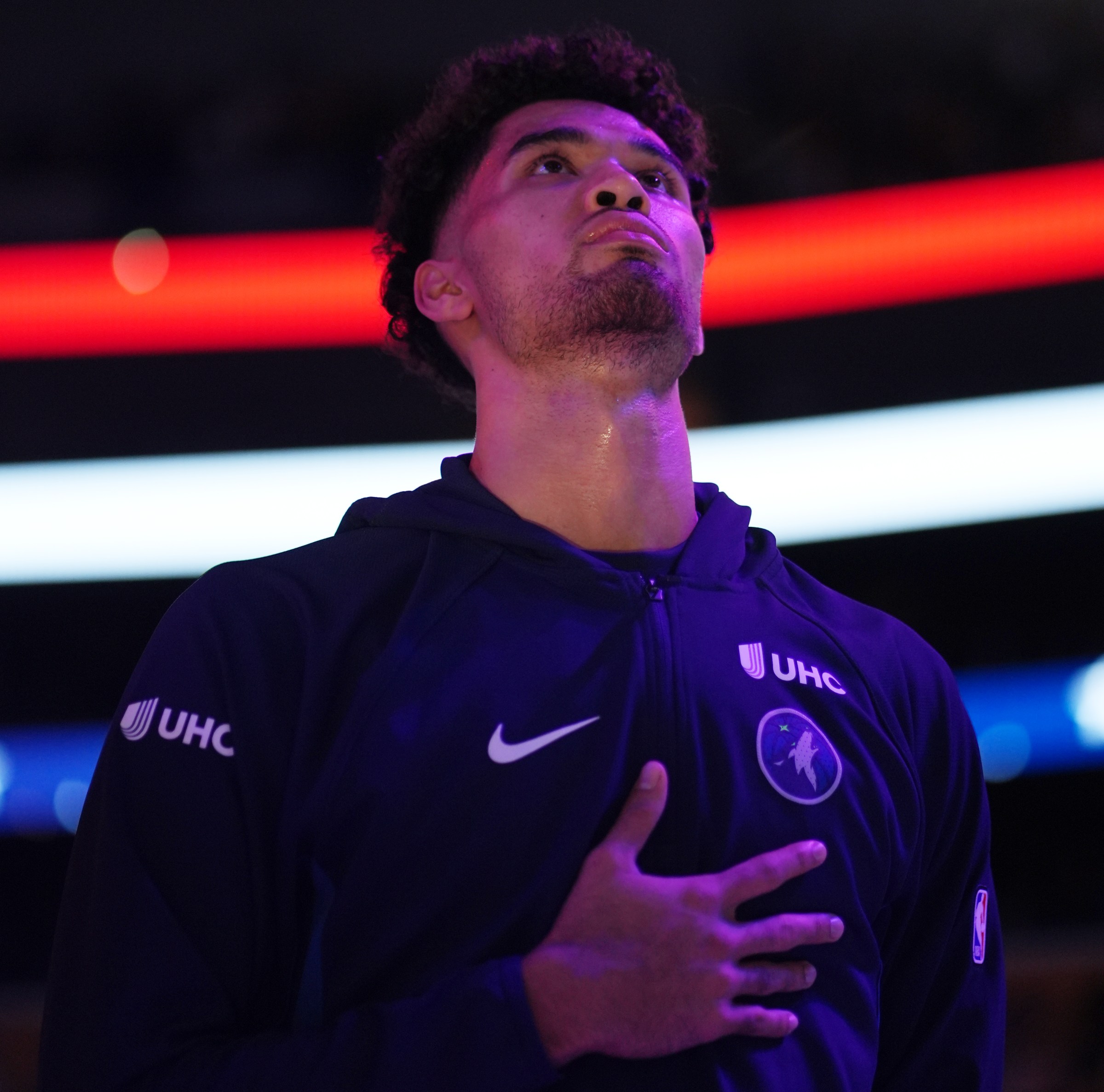 LOS ANGELES, CA - OCTOBER 24: Johnny Juzang #33 of the Minnesota Timberwolves stands for the National Anthem before the game against the Los Angeles Lakers on October 24, 2025 at Crypto.Com Arena in Los Angeles, California. NOTE TO USER: User expressly acknowledges and agrees that, by downloading and/or using this Photograph, user is consenting to the terms and conditions of the Getty Images License Agreement. Mandatory Copyright Notice: Copyright 2025 NBAE (Photo by Nick Tomoyasu/NBAE via Getty Images)