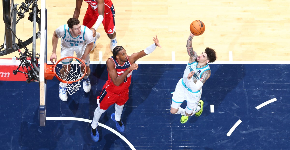 Wizards get stung by Ball and Hornets in home opener
