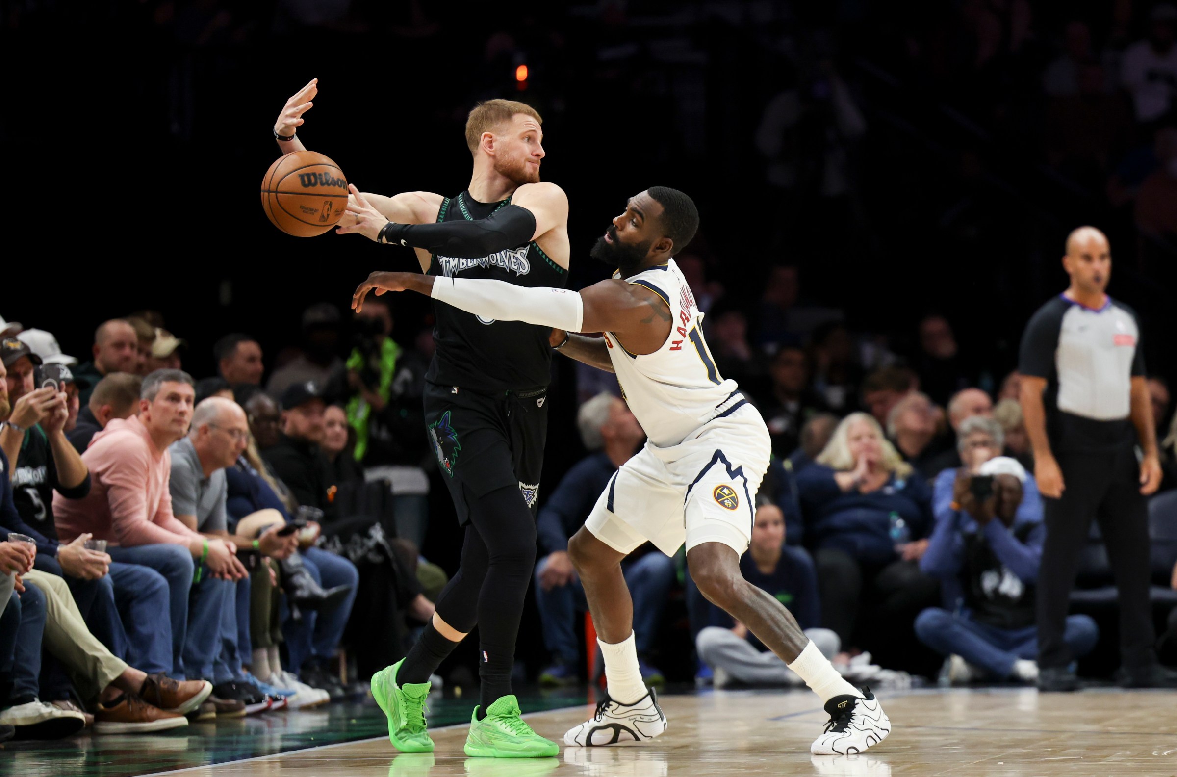 MINNEAPOLIS, MINNESOTA - OCTOBER 27: Tim Hardaway Jr. #10 of the Denver Nuggets pressures Donte DiVincenzo #0 of the Minnesota Timberwolves during the third quarter at Target Center on October 27, 2025 in Minneapolis, Minnesota. NOTE TO USER: User expressly acknowledges and agrees that, by downloading and or using this photograph, User is consenting to the terms and conditions of the Getty Images License Agreement. (Photo by Ellen Schmidt/Getty Images)