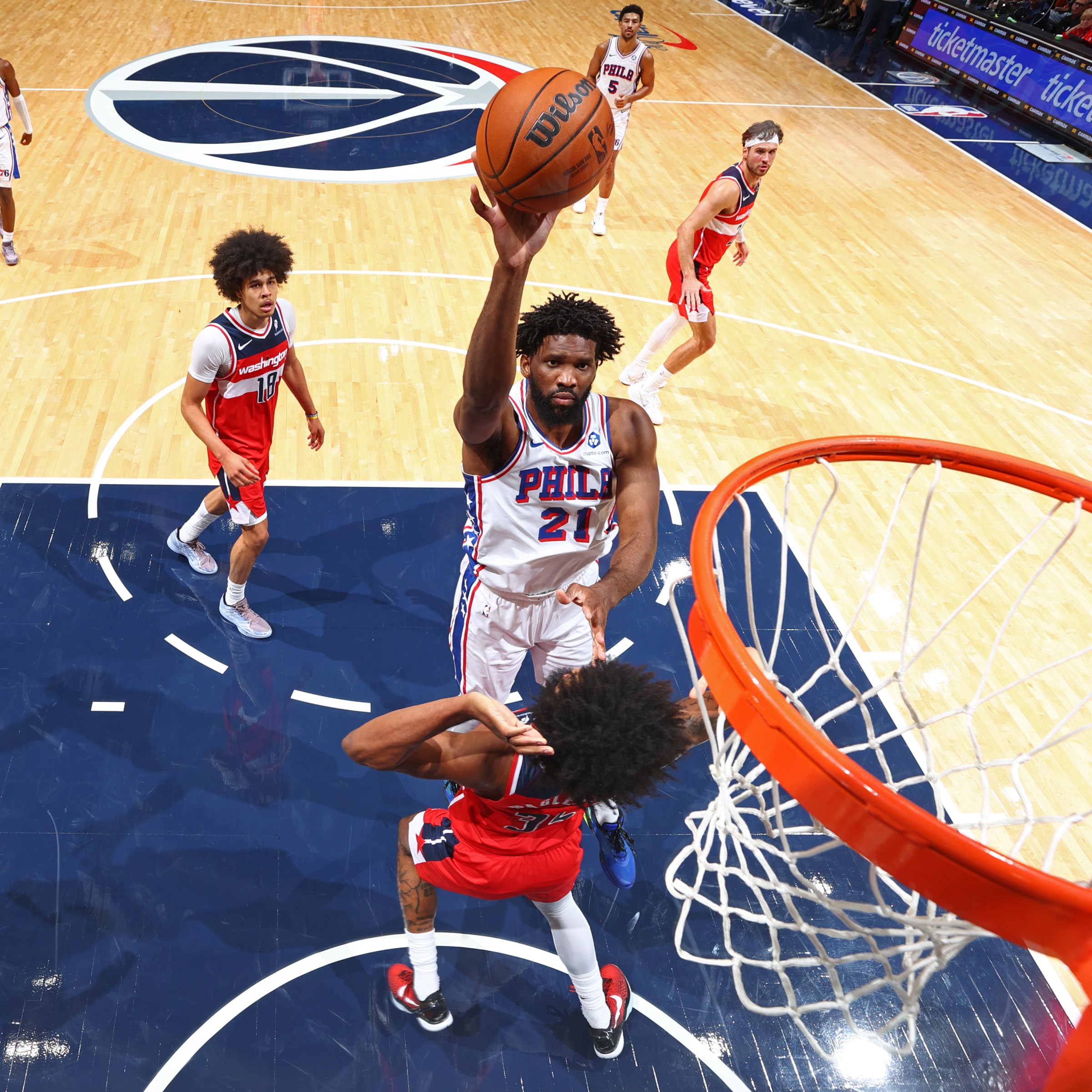 WASHINGTON, DC -  OCTOBER 28: Joel Embiid #21 of the Philadelphia 76ers drives to the basket during the game against the Washington Wizards on October 28, 2025 at Capital One Arena in Washington, DC. NOTE TO USER: User expressly acknowledges and agrees that, by downloading and or using this Photograph, user is consenting to the terms and conditions of the Getty Images License Agreement. Mandatory Copyright Notice: Copyright 2025 NBAE (Photo by Stephen Gosling/NBAE via Getty Images)