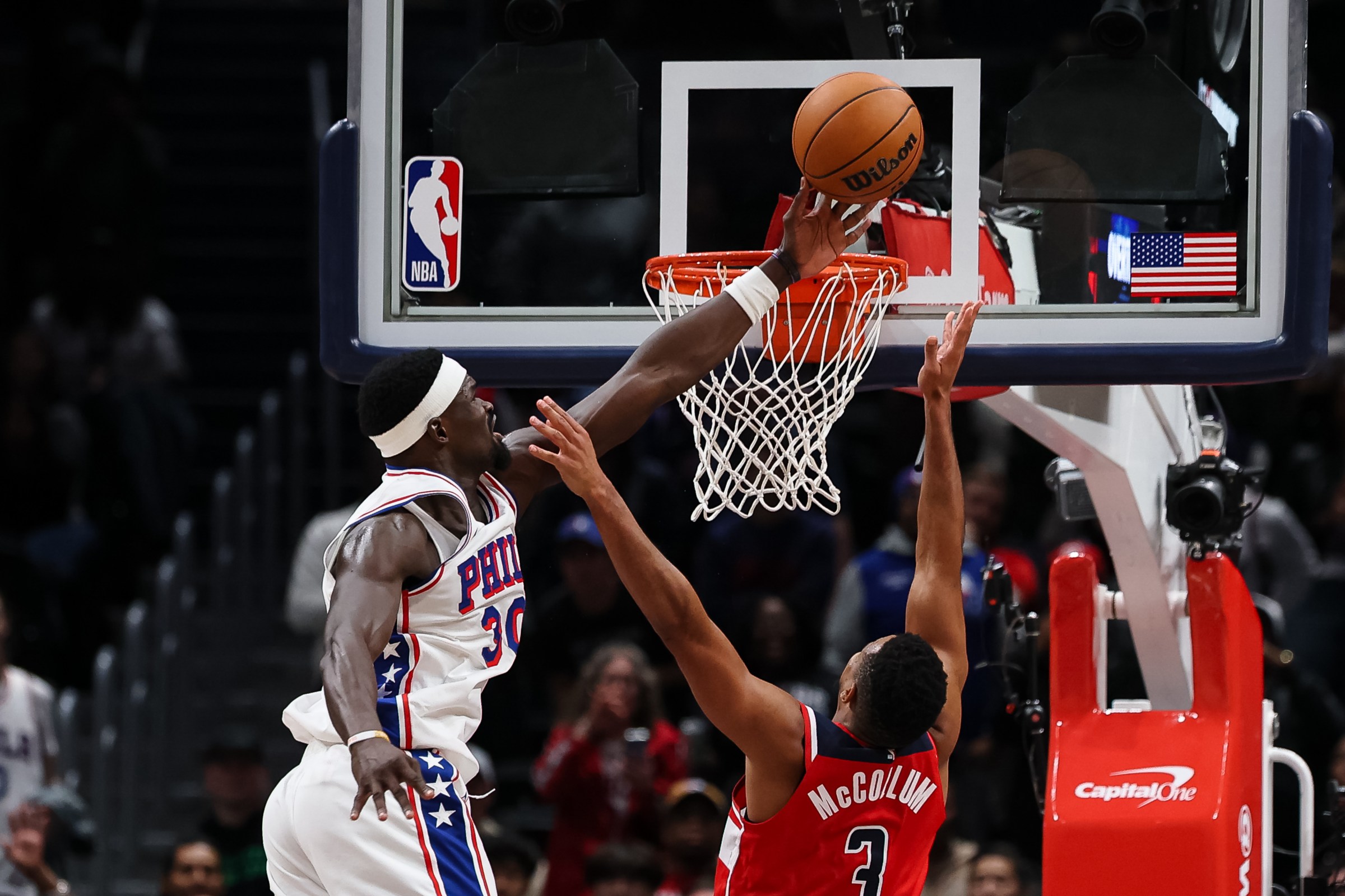 WASHINGTON, DC - OCTOBER 28: Adem Bona #30 of the Philadelphia 76ers blocks the shot of CJ McCollum #3 of the Washington Wizards during overtime at Capital One Arena on October 28, 2025 in Washington, DC. NOTE TO USER: User expressly acknowledges and agrees that, by downloading and or using this photograph, User is consenting to the terms and conditions of the Getty Images License Agreement. (Photo by Scott Taetsch/Getty Images)