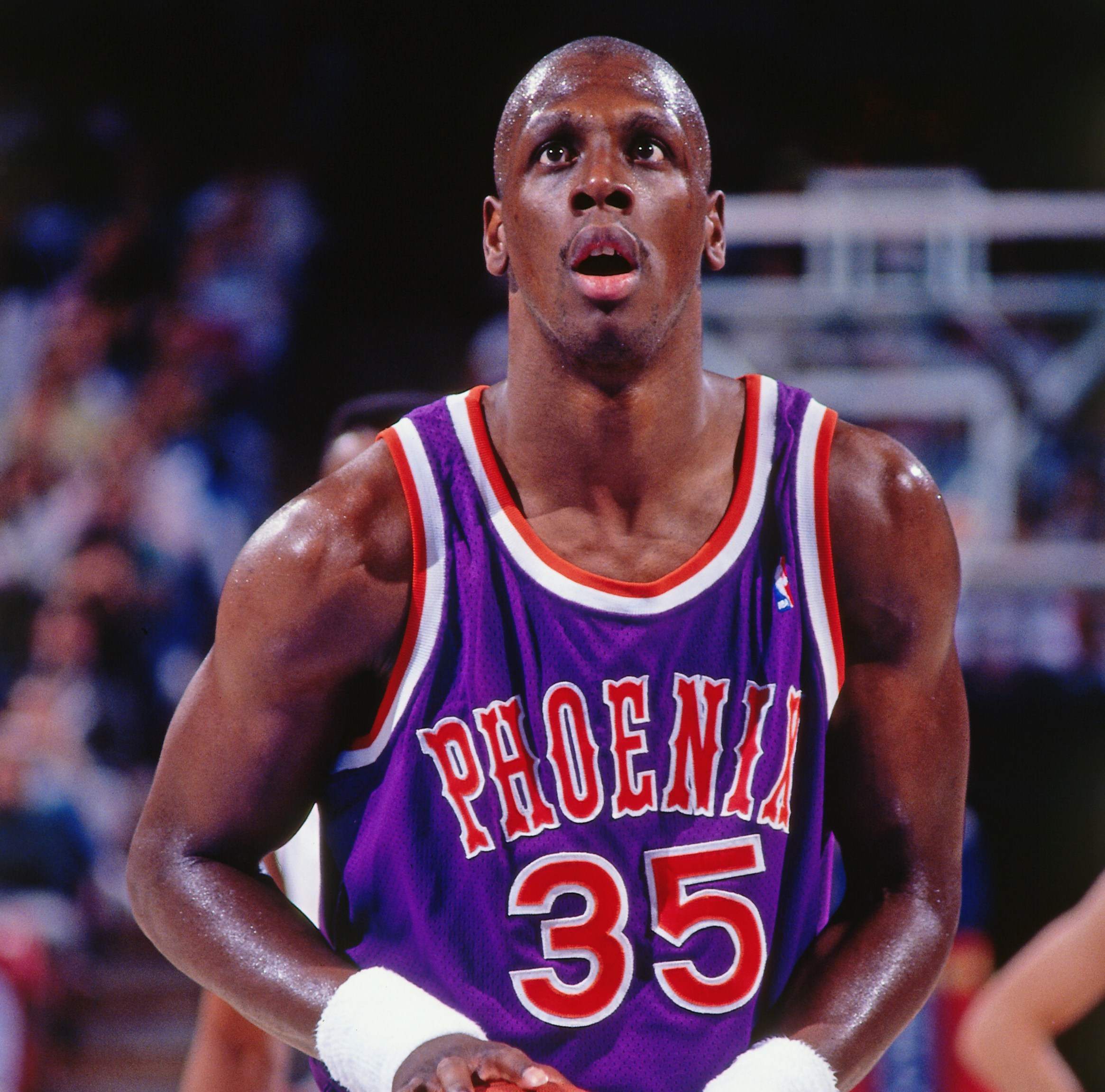 SACRAMENTO, CA - 1991: Xavier McDaniel #35 of the Phoenix Suns shoots a foul shot against the Sacramento Kings circa 1991 at Arco Arena in Sacramento, California. NOTE TO USER: User expressly acknowledges and agrees that, by downloading and or using this photograph, User is consenting to the terms and conditions of the Getty Images License Agreement. Mandatory Copyright Notice: Copyright 1991 NBAE (Photo by Rocky Widner/NBAE via Getty Images)