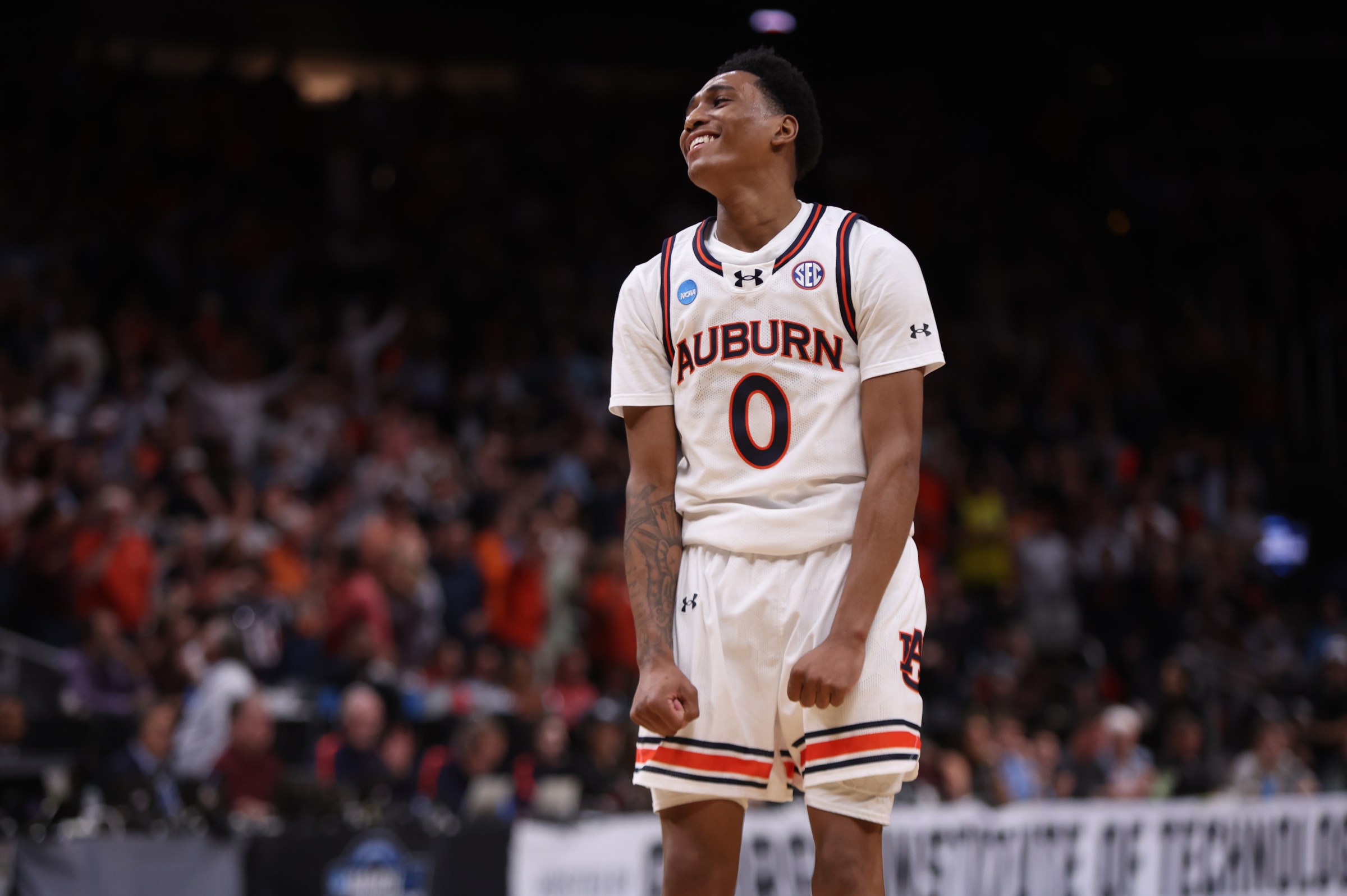 Mar 28, 2025; Atlanta, GA, USA; Auburn Tigers guard Tahaad Pettiford (0) celebrates after a basket in the second half of a South Regional semifinal of the 2025 NCAA tournament against the Michigan Wolverines at State Farm Arena. Mandatory Credit: Brett Davis-Imagn Images