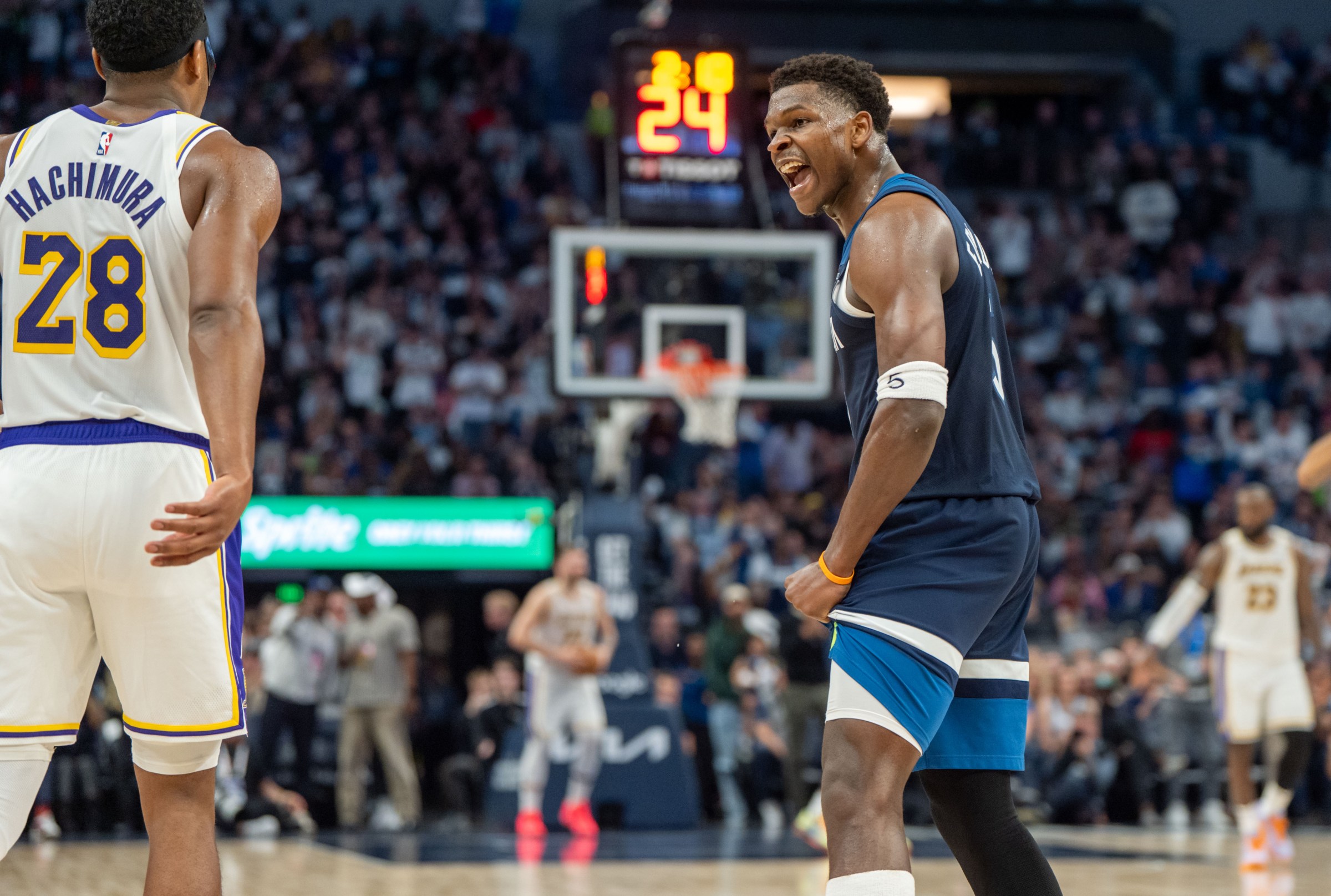 Apr 27, 2025; Minneapolis, Minnesota, USA; Minnesota Timberwolves guard Anthony Edwards (5) celebrates while looking to the Los Angeles Lakers bench in the second quarter during game four of first round for the 2025 NBA Playoffs at Target Center. Mandatory Credit: Matt Blewett-Imagn Images