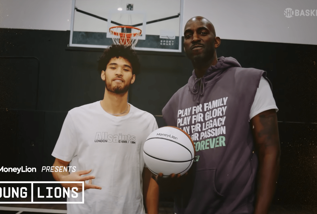 Johnny Juzang posing with Kevin Garnett