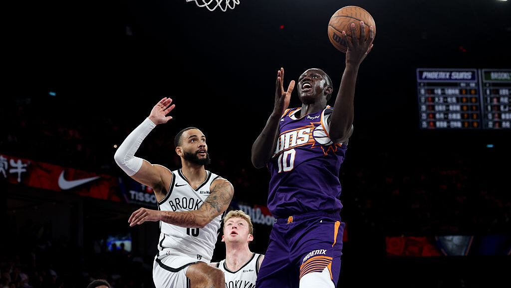 Khaman Maluach #10 of Phoenix Suns shoots during the NBA China Games 2025 against the Brooklyn Nets...