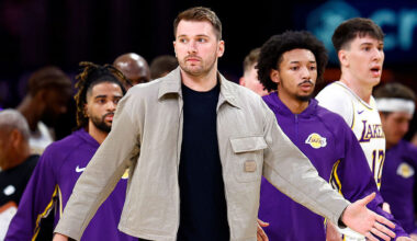 Luka Doncic #77 of the Los Angeles Lakers watches play against the Golden State Warriors in the fir...