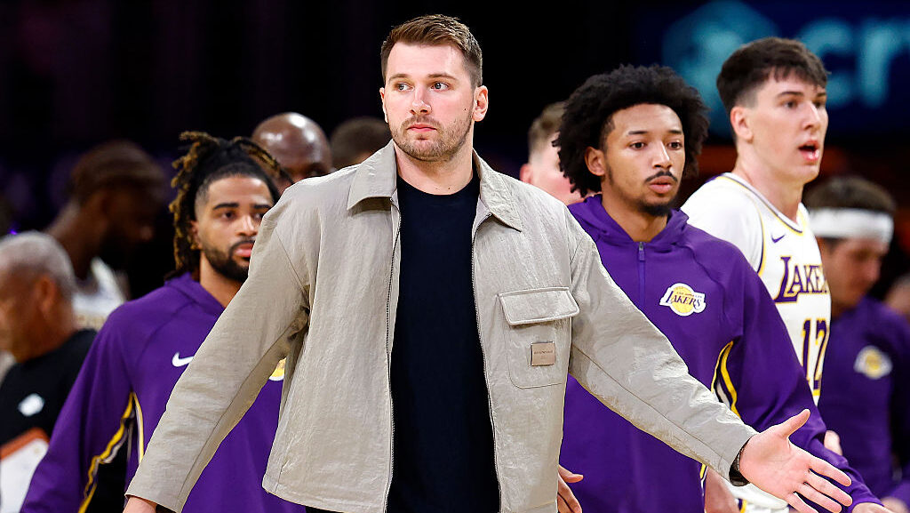 Luka Doncic #77 of the Los Angeles Lakers watches play against the Golden State Warriors in the fir...