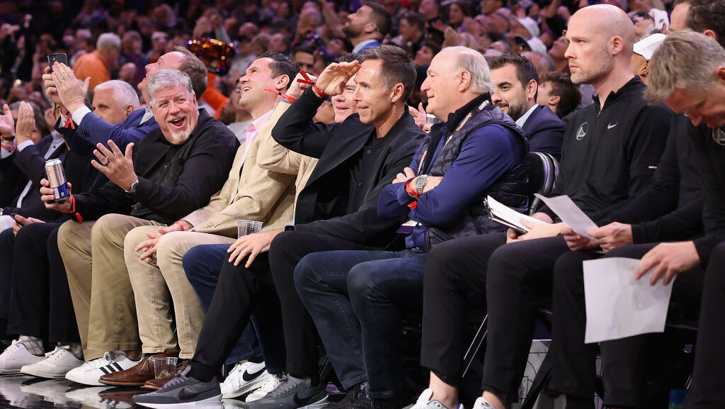 Former Phoenix Suns guard Steve Nash waves to fans during the NBA game at Footprint Center on Decem...