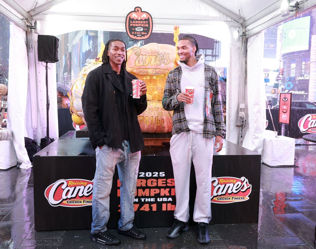 Terance Mann and Ziaire Williams attend Raising Cane's unveiling of the country's largest pumpkin with celebrity friends at Military Island, Times Square on October 30, 2025 in New York City. 