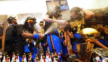 Oklahoma City Thunder guard Luguentz Dort, left, celebrates with teammates in the locker room after winning the NBA basketball championship with a Game 7 victory against the Indiana Pacers Sunday, June 22, 2025, in Oklahoma City. (AP Photo/Julio Cortez)