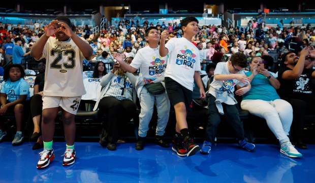 Students dance during the annual Pick, Read & Roll event...