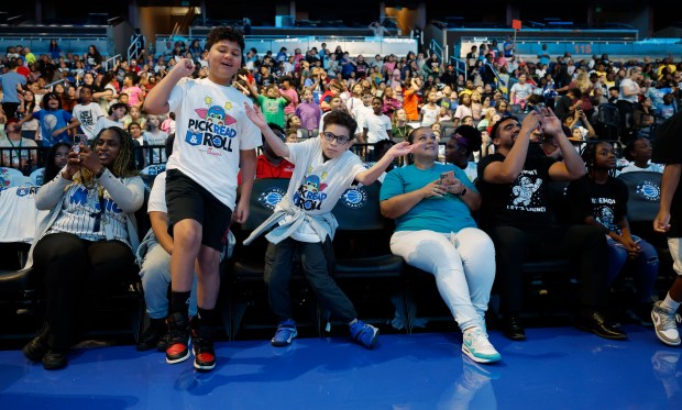 Students dance during the annual Pick, Read & Roll event...