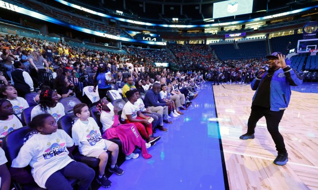 DJ D-Strong emcees the annual Pick, Read & Roll event...