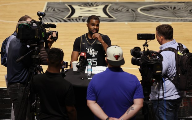 UCF forward Devan Cambridge (35) does interviews during basketball media day in Addition Financial Arena. (Ricardo Ramirez Buxeda/Orlando Sentinel)