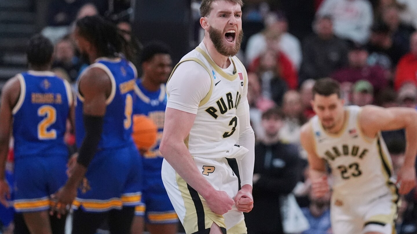 Who is No. 1 in the preseason AP Top 25 basketball poll?