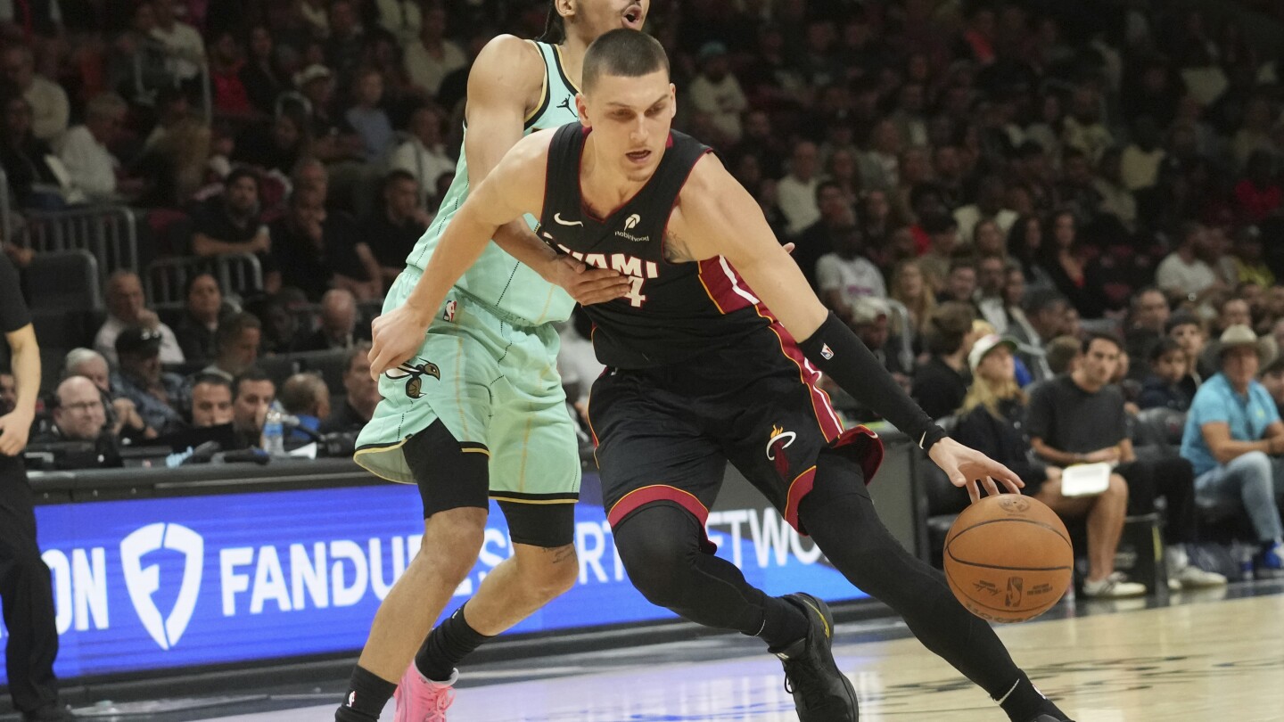 Wiggins scores 42 points and Heat roll past Hornets 122-105 to snap 10-game losing streak