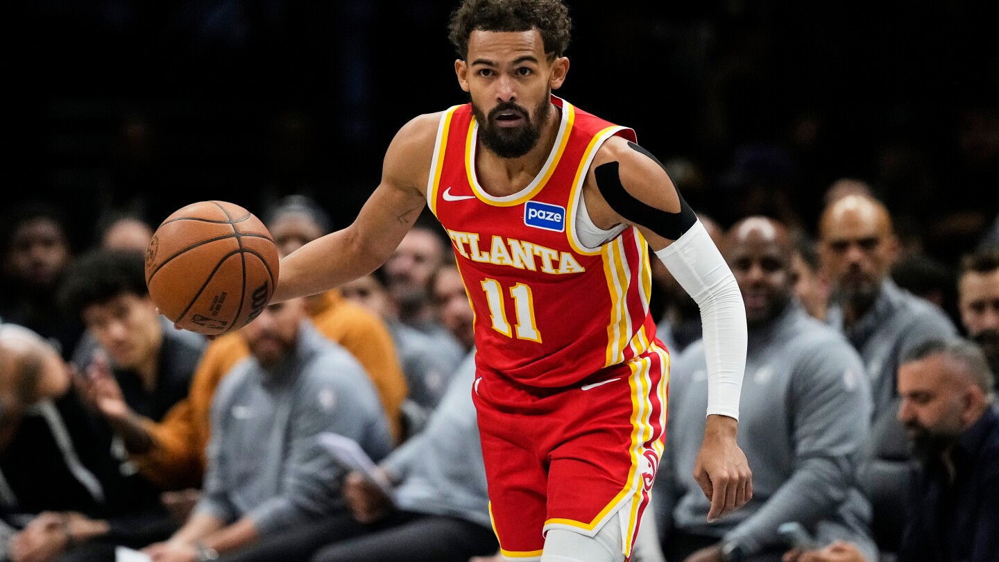 Hawks' Trae Young suffers sprained right knee vs. Nets