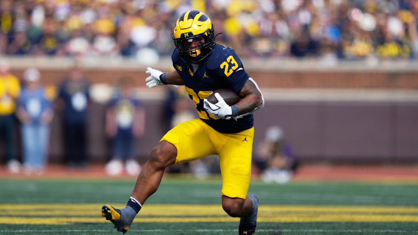 Michigan takes advantage of Washington turnovers, pulls away to win 24-7 after 18-point loss to USC