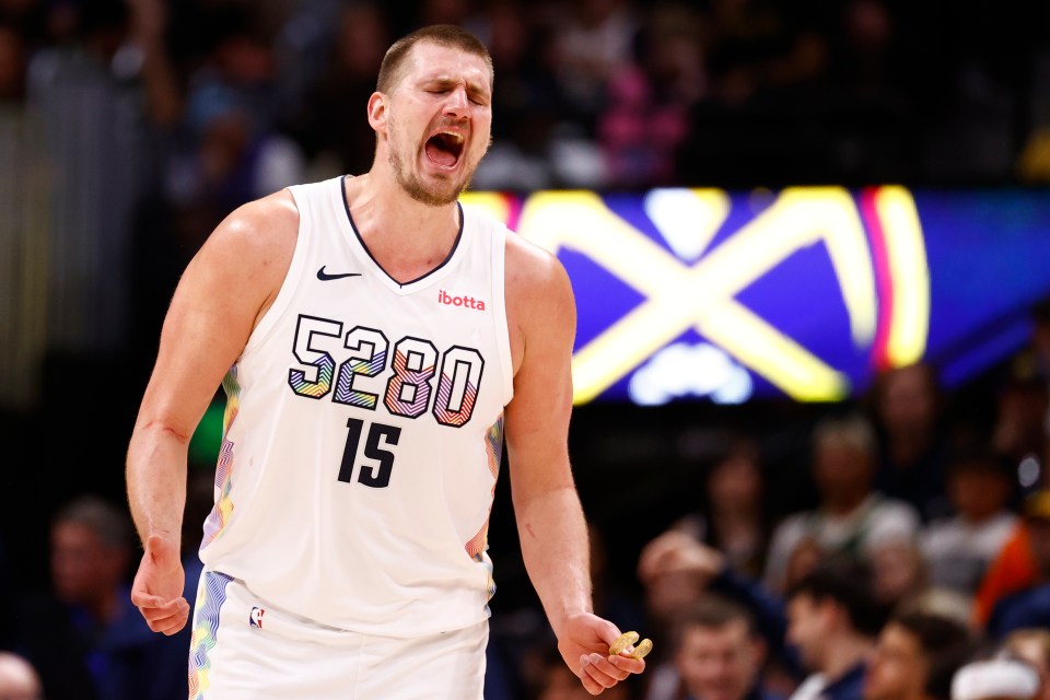 Nikola Jokic celebrates on the court for the Denver Nuggets