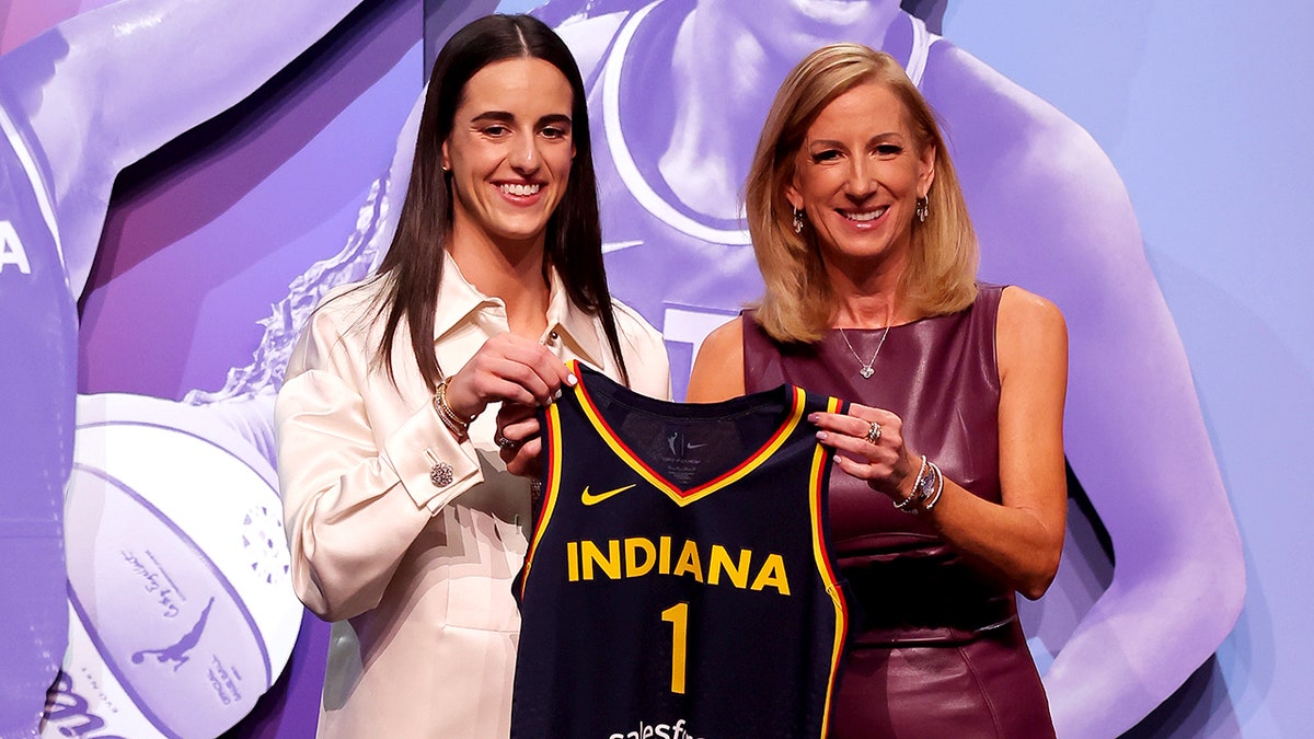 Caitlin Clark and Cathy Engelbert at the WNBA Draft