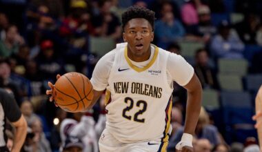 Nov 17, 2025; New Orleans, Louisiana, USA;  New Orleans Pelicans center Derik Queen (22) brings the ball up court against the Oklahoma City Thunder during the second half at Smoothie King Center. Mandatory Credit: Stephen Lew-Imagn Images