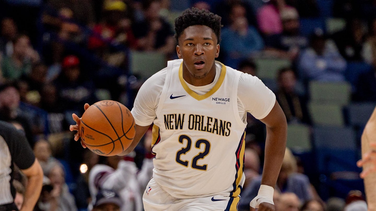 Nov 17, 2025; New Orleans, Louisiana, USA;  New Orleans Pelicans center Derik Queen (22) brings the ball up court against the Oklahoma City Thunder during the second half at Smoothie King Center. Mandatory Credit: Stephen Lew-Imagn Images