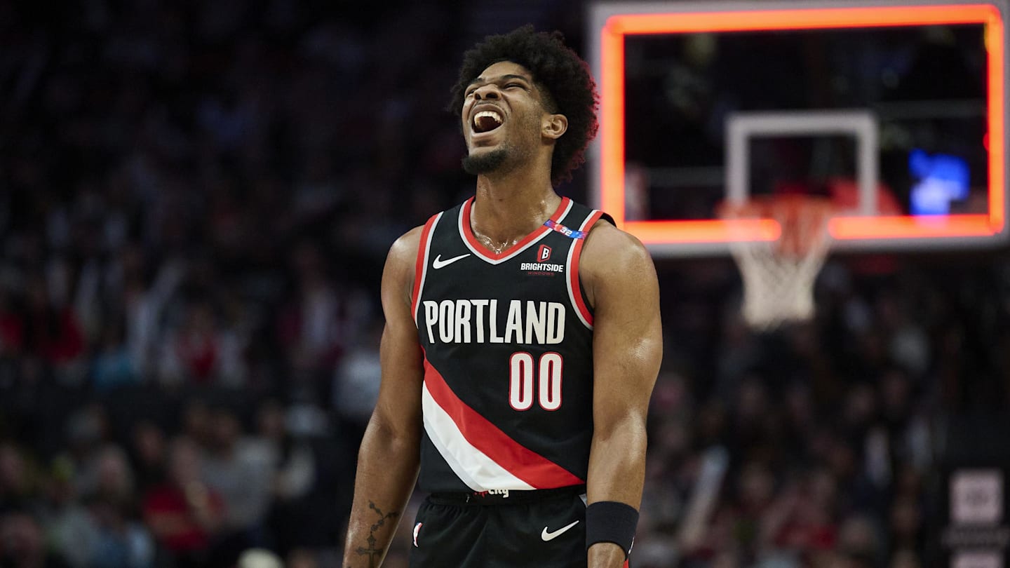 Feb 22, 2025; Portland, Oregon, USA; Portland Trail Blazers guard Scoot Henderson (00) reacts after missing a three point basket during the second half against the Charlotte Hornets at Moda Center. Mandatory Credit: Troy Wayrynen-Imagn Images
