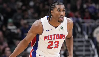 Detroit Pistons guard Jaden Ivey (23) pushes the ball up the court against the Milwaukee Bucks in the second half at Fiserv Forum.
