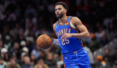 Nov 15, 2025; Charlotte, North Carolina, USA; Oklahoma City Thunder guard Ajay Mitchell (25) brings the ball up court against the Charlotte Hornets during the second half at Spectrum Center. Mandatory Credit: Jim Dedmon-Imagn Images