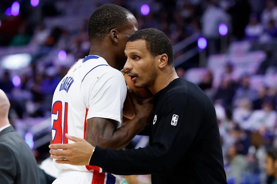 Oct 26, 2025; Detroit, Michigan, USA; Boston Celtics head coach Joe Mazzulla talks to Detroit Pistons guard Javonte Green (31) in the first half at Little Caesars Arena. Mandatory Credit: Rick Osentoski-Imagn Images