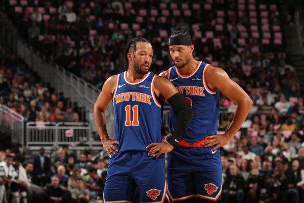 New York Knicks teammates Jalen Brunson and Josh Hart talking to eachother on the court