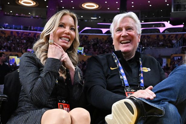 Jeanie Buss (L) and Mark Walter attend a basketball game between the Los Angeles Lakers and the Golden State Warriors at Crypto.com Arena on October 21, 2025 in Los Angeles, California