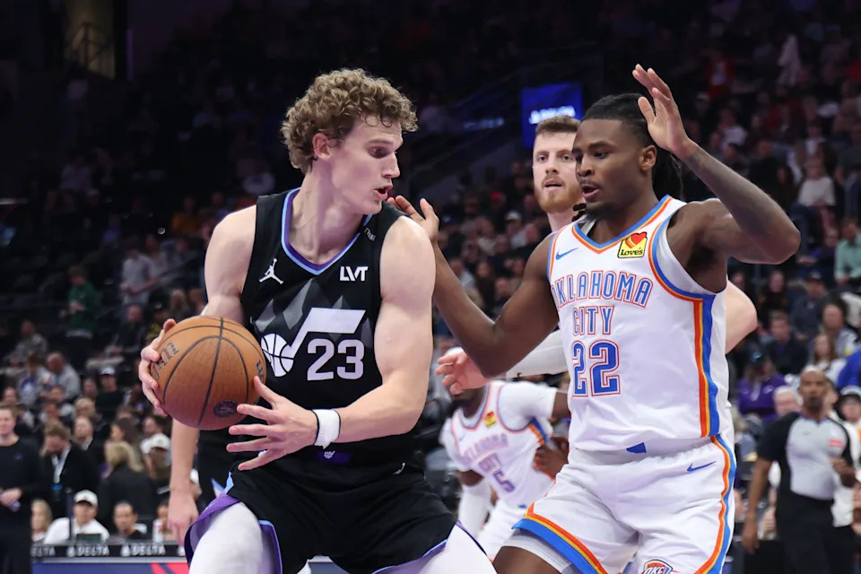 Nov 21, 2025; Salt Lake City, Utah, USA; Utah Jazz forward Lauri Markkanen (23) posts up against Oklahoma City Thunder guard Cason Wallace (22) during the second half at Delta Center. Mandatory Credit: Rob Gray-Imagn Images
