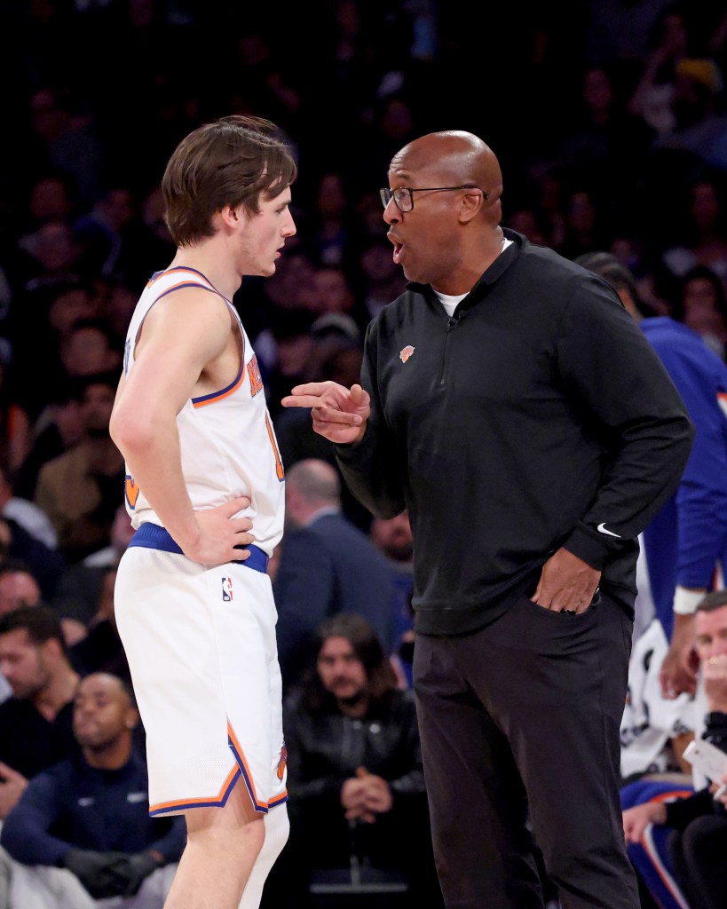 New York Knicks head coach Mike Brown speaks with New York Knicks guard Tyler Kolek #13 in the third quarter.