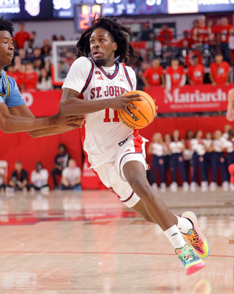 St. John's Red Storm guard Ian Jackson (11) drives to the basket during the second half.