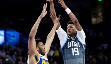 Utah Jazz forward Ace Bailey (19) holds his follow through on his shot while guarded by Indiana Pac...