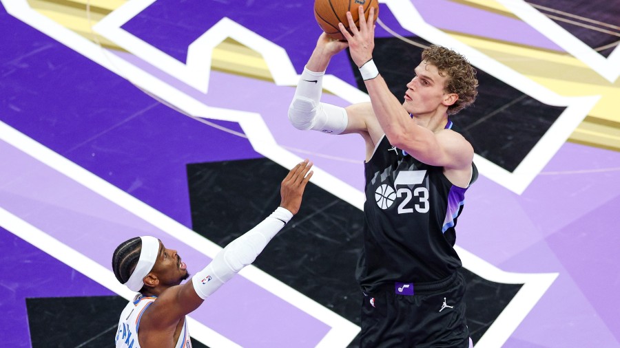 Utah Jazz forward Lauri Markkanen (23) shoots over Oklahoma City Thunder guard Shai Gilgeous-Alexan...