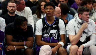Utah Jazz guard Ace Bailey (19) sits on the bench with a wrap on his right knee after getting injur...