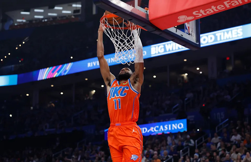 Nov 26, 2025; Oklahoma City, Oklahoma, USA; Oklahoma City Thunder guard Isaiah Joe (11) dunks against the Minnesota Timberwolves during the second quarter at Paycom Center. Mandatory Credit: Alonzo Adams-Imagn Images