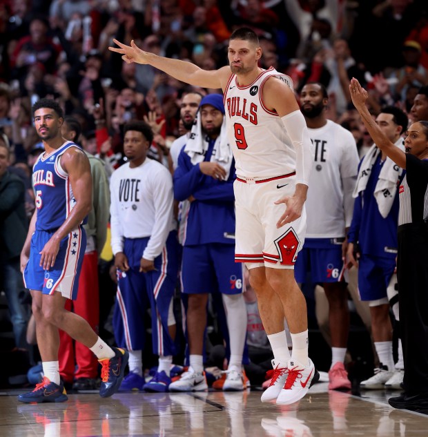 Chicago Bulls center Nikola Vučević (9) celebrates after hitting the game-winning 3-pointer in the second half of a game against the Philadelphia 76ers at the United Center in Chicago on Nov. 4, 2025. (Chris Sweda/Chicago Tribune)