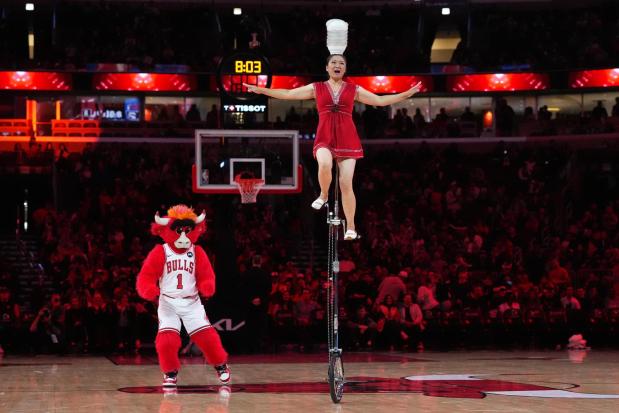 Red Panda performs in the halftime during an NBA basketball game between the Philadelphia 76ers and the Chicago Bulls in Chicago, Tuesday, Nov. 4, 2025. (AP Photo/Nam Y. Huh)