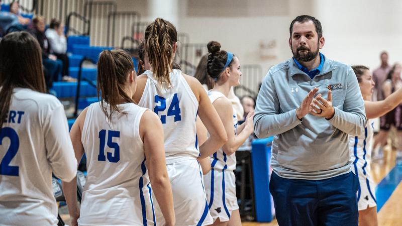 Monks Top Terriers, Woodside Earns First NCAA Coaching Victory
